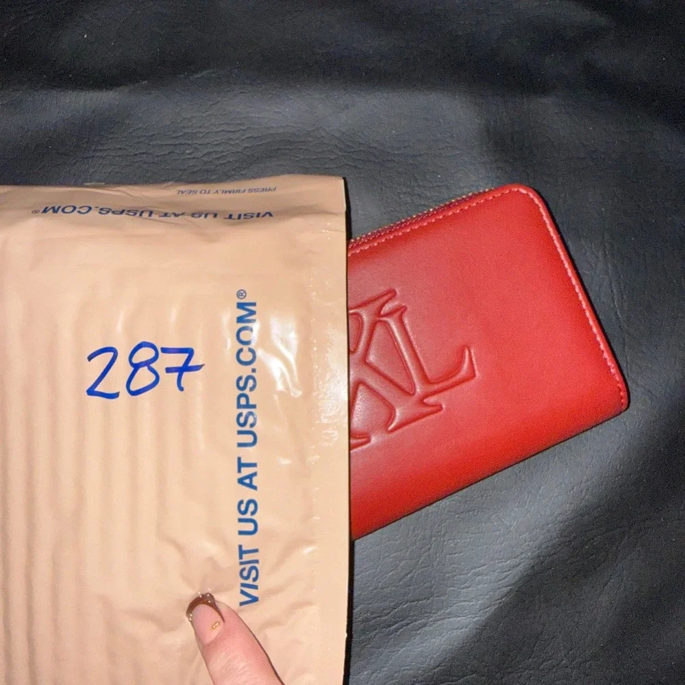 CXL by Christian Lacroix Red Embossed Logo Zip Around Wristlet Wallet NWT